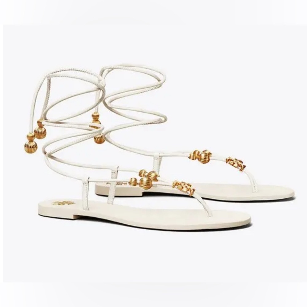 Elegant White leather Tory Burch capri sandals with gold charms Womens size 11